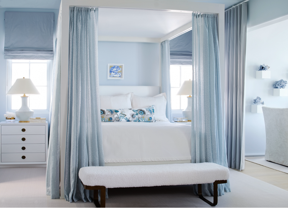Beach home's misty blue primary bedroom suite