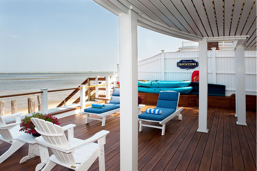 An outdoor wooden deck with outdoor furniture