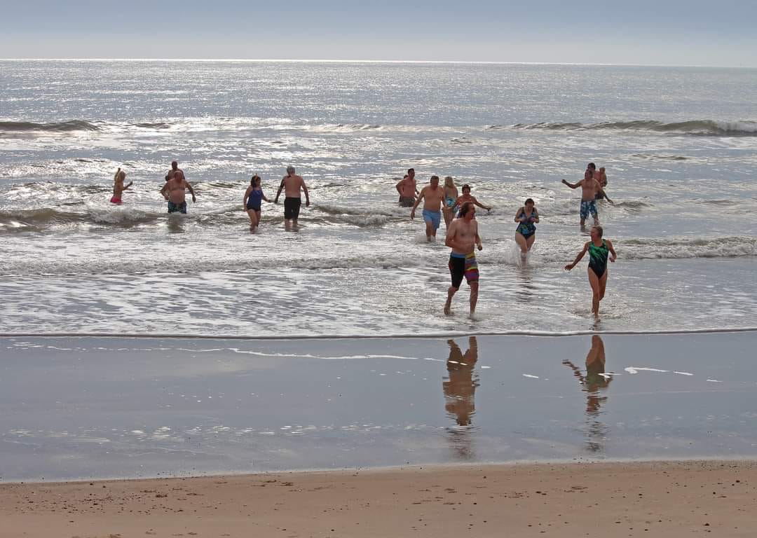 Dive into 2024 with Polar Plunging! Beach Homes Realty Articles and