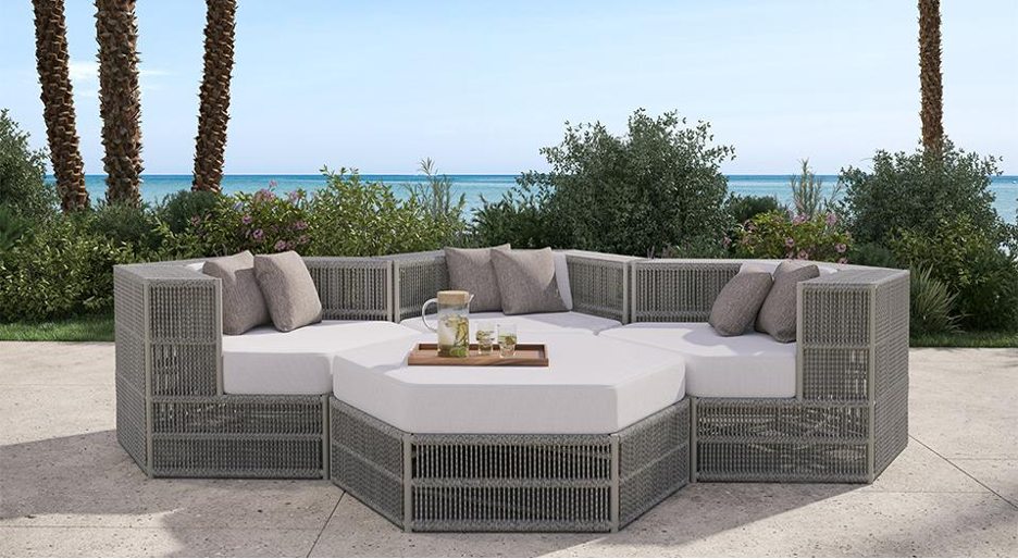 Six Collection from Tropitone on patio with an ocean backdrop and palm trees.