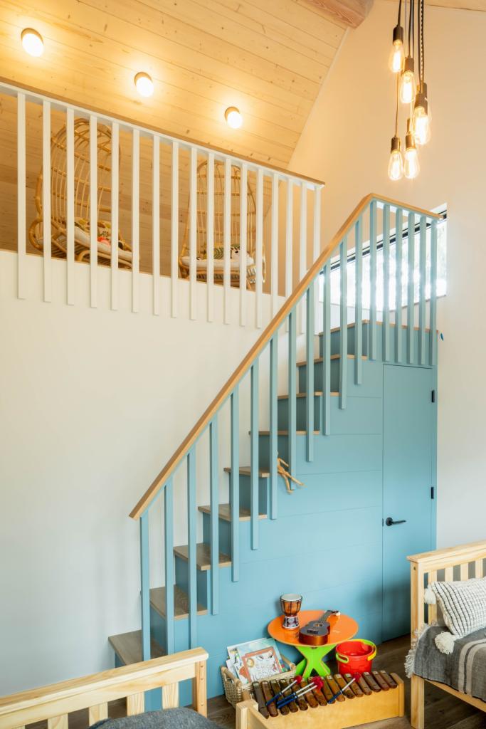 Kid's loft with miniature staircase to a seating nook