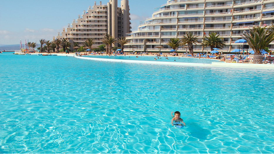 A child swimming in the world's largest swimming pool at San Alfonso del Mar – Algarrobo, Chile