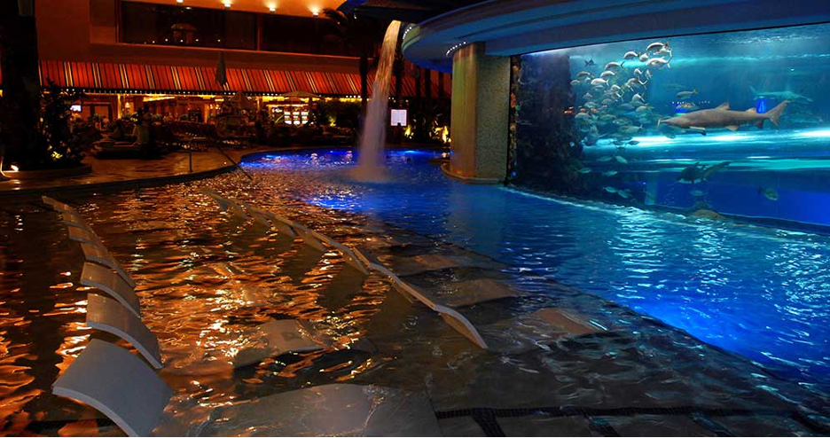 The exterior pool area looking into the shark tank called The Tank Pool – Golden Nugget Hotel, Las Vegas, NV