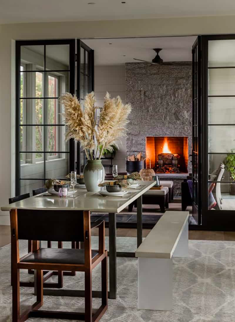 Embrace a Coastal Winter Palette in coastal dining / living area with fireplace