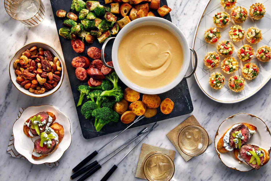 An array of delicious and elevated finger foods for your next beachside tailgate