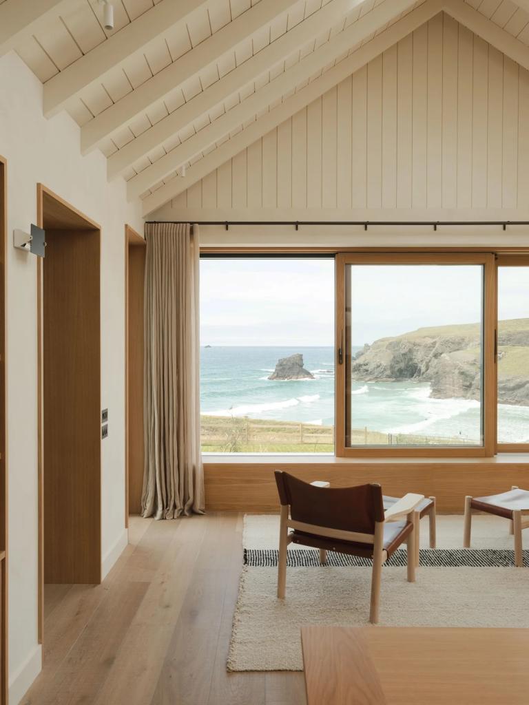 A surf-inspired retreat on the windswept cliff's of England's north coast, the Cornwall Retreat designed by London-based studio De Rosee Sa 
