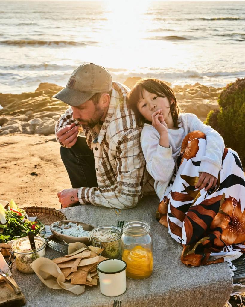Family pinic at the beach with