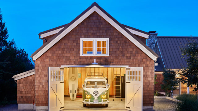 Coastal garage with new exterior doors and double-height interior storage