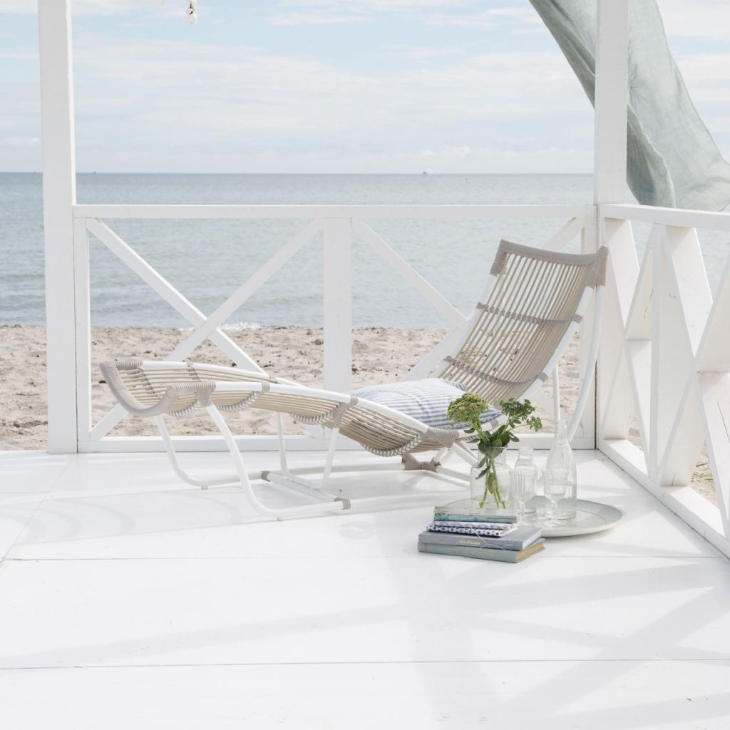 Slow Down With Reading, Sketching, or Journaling by the beach
